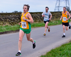 Daniel Palmer being chased by fellow Strider Michael Slater at Oxspring