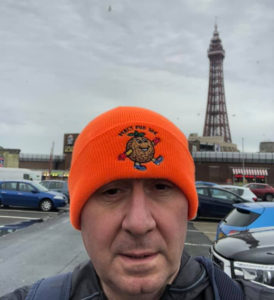 Chris Harvey models a Percy Pud hat