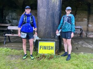 Jennie and Alison by the finish sign