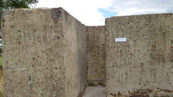 Concrete urinal wall